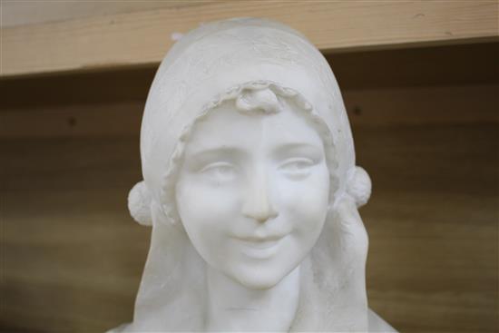 An early 20th century North European carved alabaster bust of a Flemish girl wearing a lace bonnet, unsigned, on grey marble plinth, he
